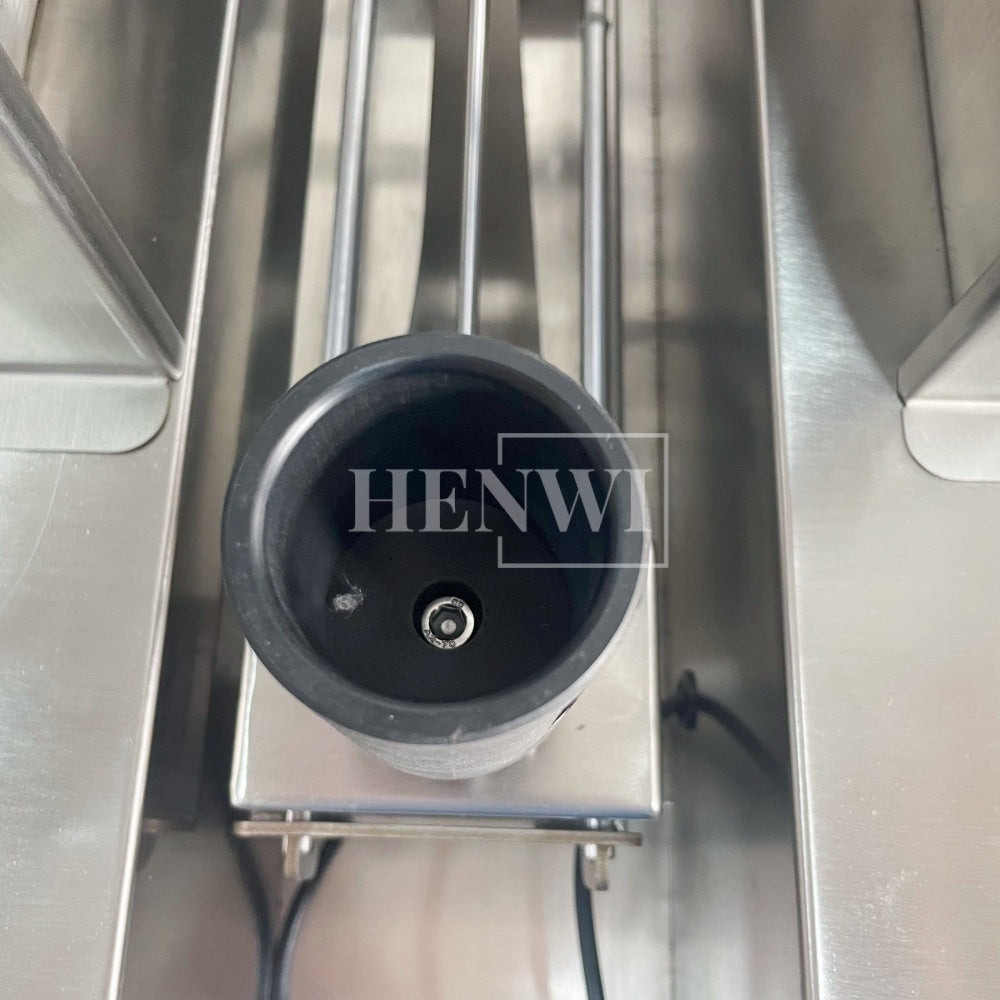 Henwi HWFM-S-VF1 Полуавтоматическая машина для розлива и упаковки жидкостей с одной насадкой Вертикальный наполнитель для бутылок с 1 головкой