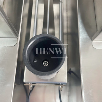 Henwi HWFM-S-VF1 Полуавтоматическая машина для розлива и упаковки жидкостей с одной насадкой Вертикальный наполнитель для бутылок с 1 головкой