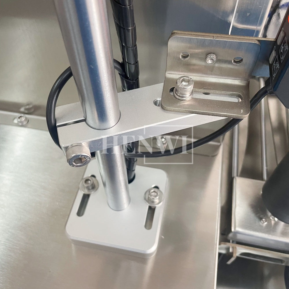 Henwi HWFM-S-VF1 Полуавтоматическая машина для розлива и упаковки жидкостей с одной насадкой Вертикальный наполнитель для бутылок с 1 головкой