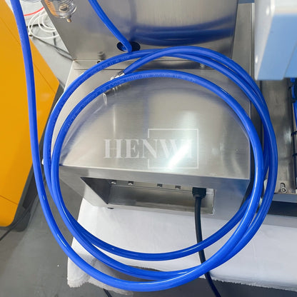 Henwi HWFM-S-VF1 Полуавтоматическая машина для розлива и упаковки жидкостей с одной насадкой Вертикальный наполнитель для бутылок с 1 головкой