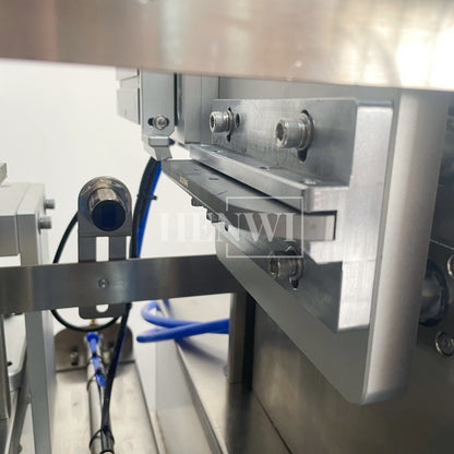 Henwi HWFM-S-VF1 Полуавтоматическая машина для розлива и упаковки жидкостей с одной насадкой Вертикальный наполнитель для бутылок с 1 головкой