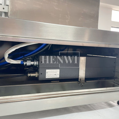 Henwi HWFM-S-VF1 Полуавтоматическая машина для розлива и упаковки жидкостей с одной насадкой Вертикальный наполнитель для бутылок с 1 головкой