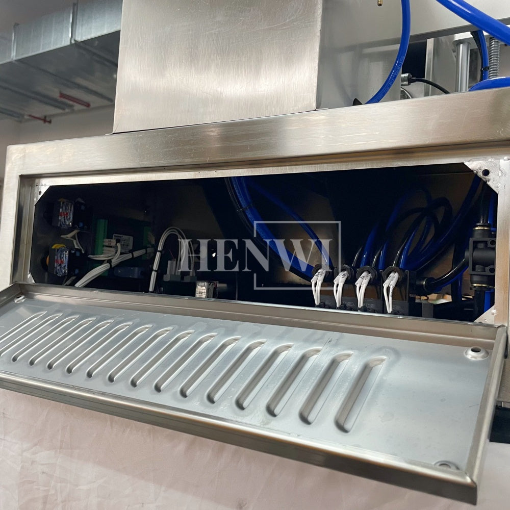 Henwi HWFM-S-VF1 Полуавтоматическая машина для розлива и упаковки жидкостей с одной насадкой Вертикальный наполнитель для бутылок с 1 головкой