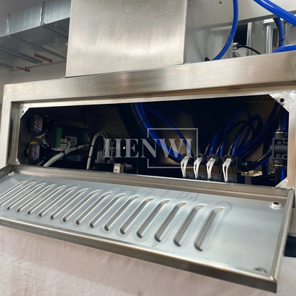 Henwi HWFM-S-VF1 Полуавтоматическая машина для розлива и упаковки жидкостей с одной насадкой Вертикальный наполнитель для бутылок с 1 головкой