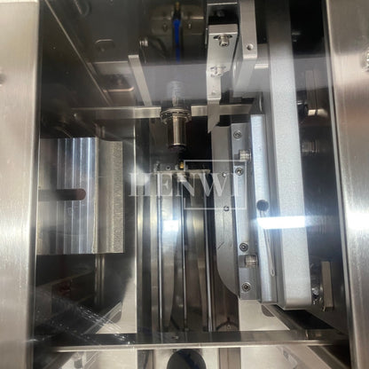 Máquina de llenado y sellado de tubos compuestos semiautomática Henwi HWTM-USS-1 Llenadora de tubos laminados y selladora por ultrasonido